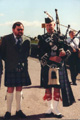 Tour guide and a Scottish piper